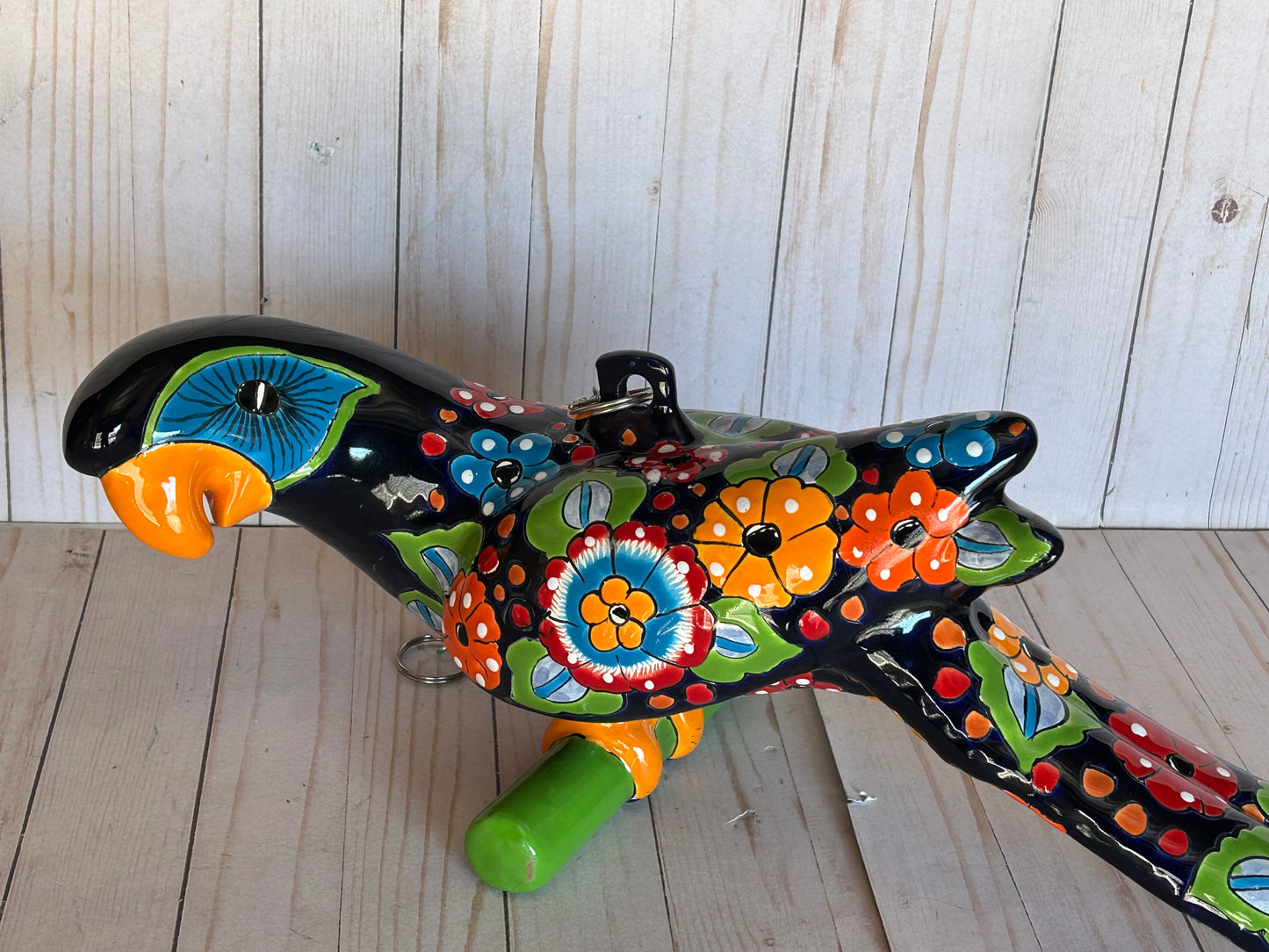 Hanging Ceramic Parrot: Mexican Folk Art, Floral Pattern, Cobalt Blue Background