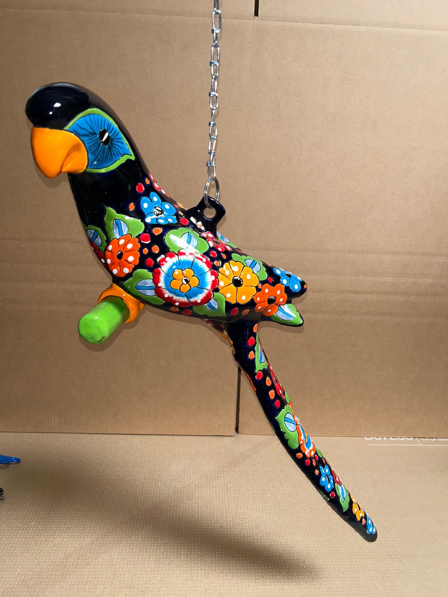 Hanging Ceramic Parrot: Mexican Folk Art, Floral Pattern, Cobalt Blue Background