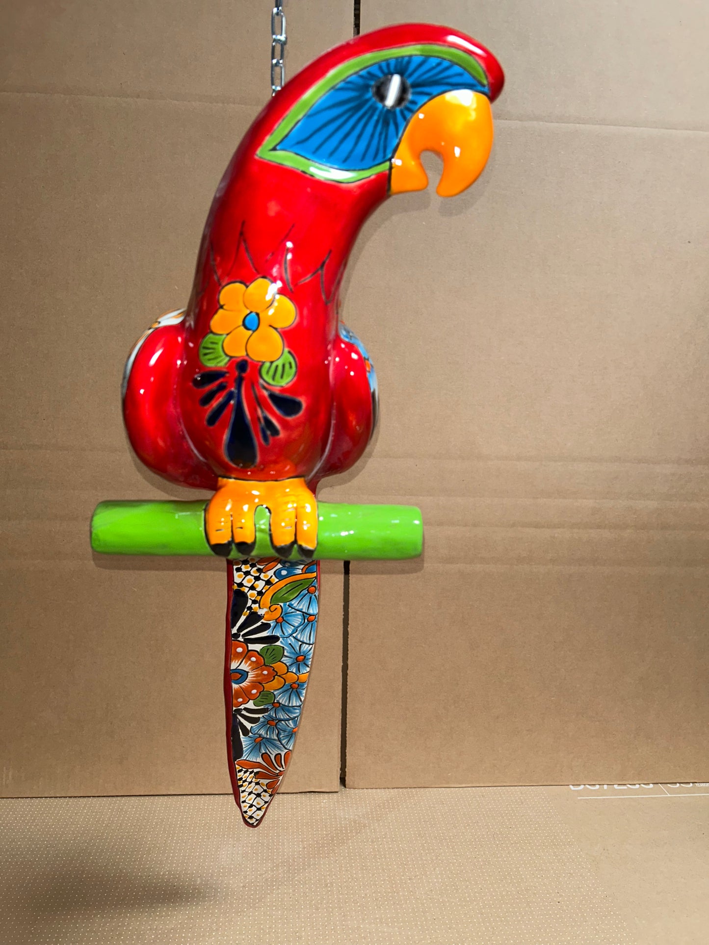 Mexican Talavera Ceramic. Hanging Parrot Red Background Classic Puebla