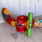 Mexican Talavera Ceramic. Hanging Parrot Red Background Classic Puebla