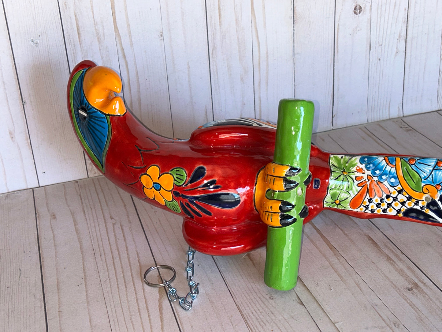 Mexican Talavera Ceramic. Hanging Parrot Red Background Classic Puebla