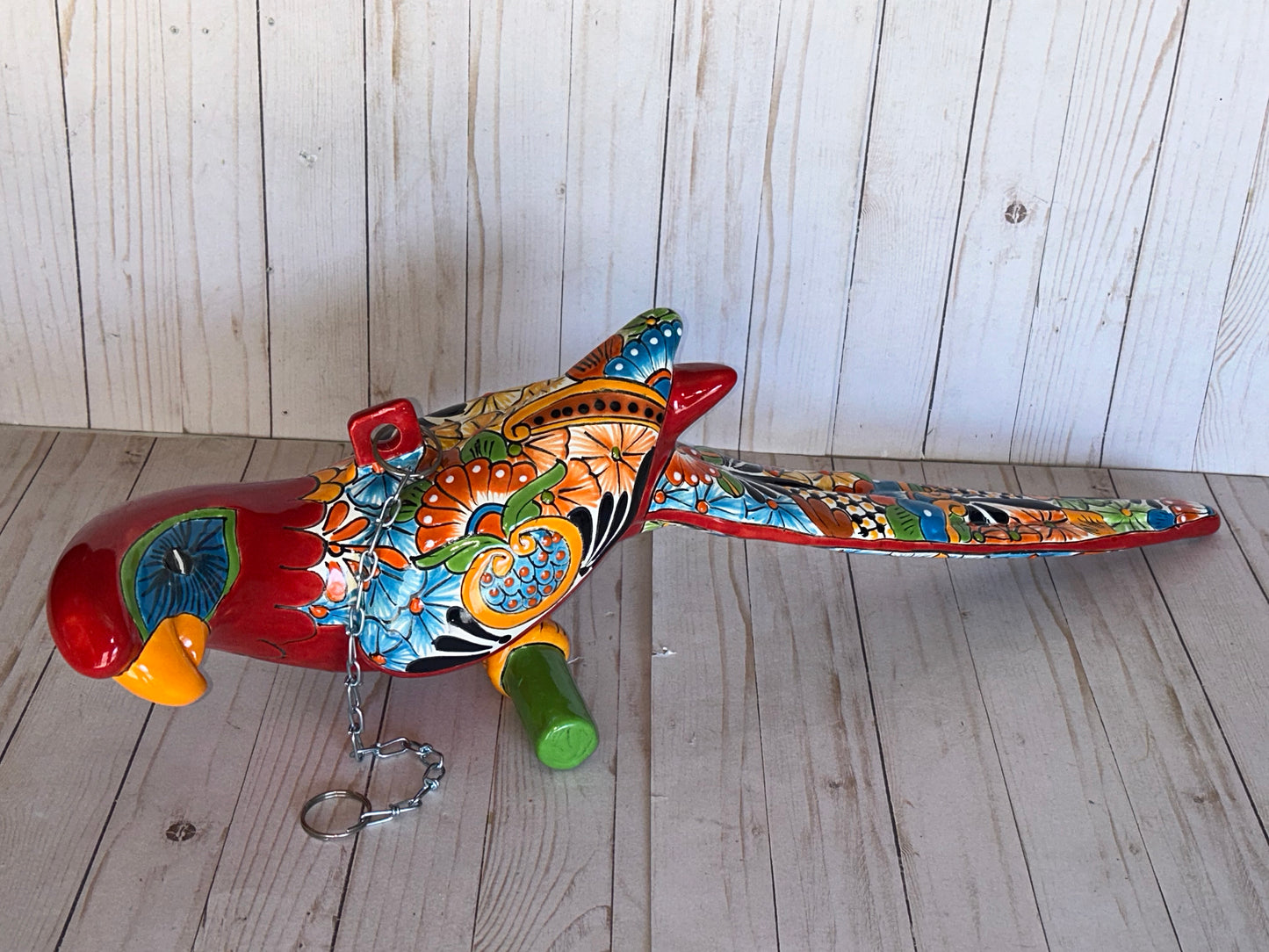 Mexican Talavera Ceramic. Hanging Parrot Red Background Classic Puebla