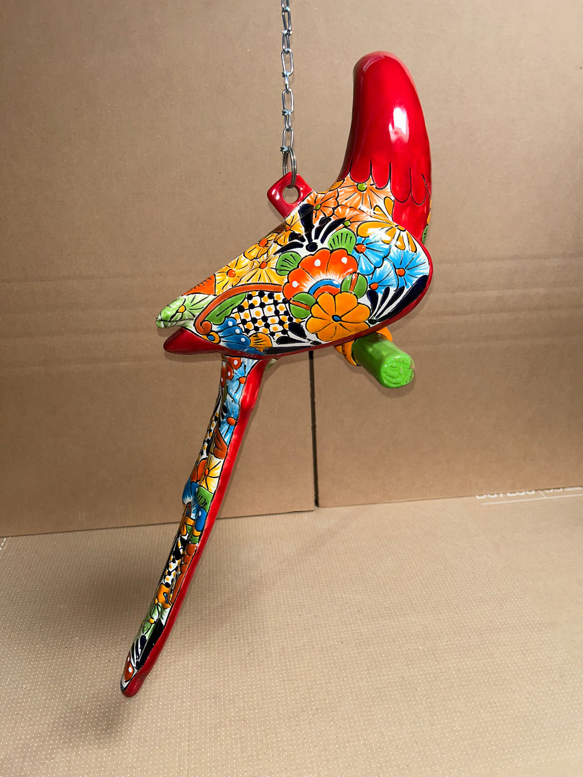 Mexican Talavera Ceramic. Hanging Parrot Red Background Classic Puebla