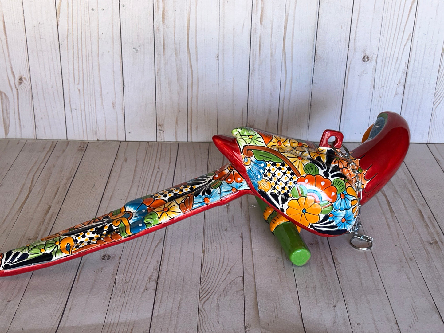 Mexican Talavera Ceramic. Hanging Parrot Red Background Classic Puebla