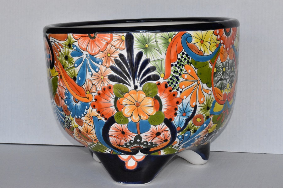 Molcajete flower planter, three feet stand pot colorful and beautiful.