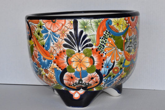 Molcajete flower planter, three feet stand pot colorful and beautiful.