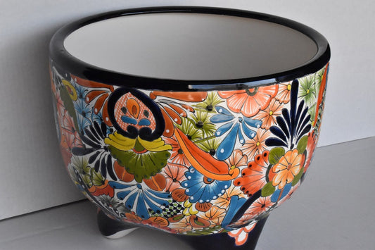 Molcajete flower planter, three feet stand pot colorful and beautiful.