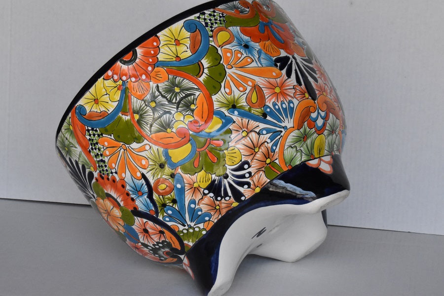 Molcajete flower planter, three feet stand pot colorful and beautiful.