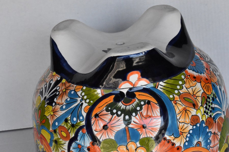 Molcajete flower planter, three feet stand pot colorful and beautiful.