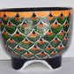 Molcajete flower planter, three feet stand pot colorful and beautiful.