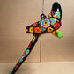 Hanging Ceramic Parrot: Mexican Folk Art, Floral Pattern, Cobalt Blue Background